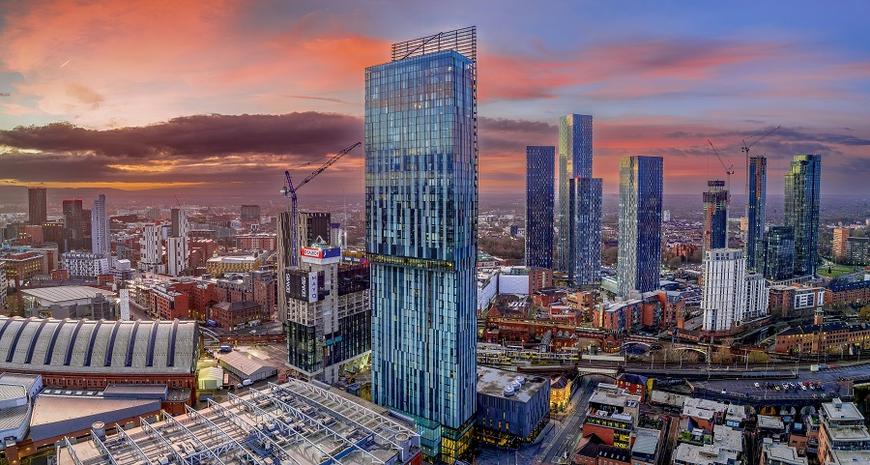 Air Conditioning Manchester | Manchester City centre Aerial night view of Deansgate Square and